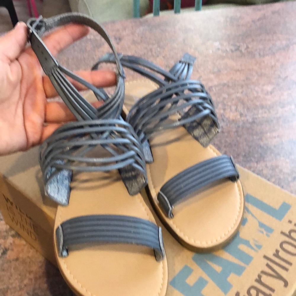 Brand new never been worn Leather strap sandals.